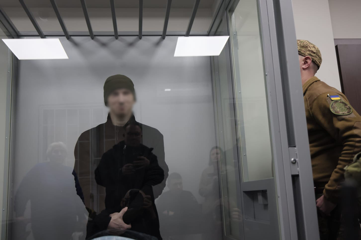 Російський військовий, який розстріляв українського полоненого на запорізькому напрямку, в залі суду отримує свій вирок – довічне ув’язнення. Місто Запоріжжя. Листопад 2025 року.