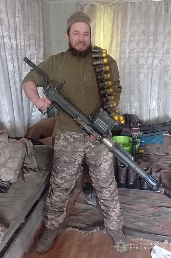 Євген Черноштан зі зброєю в руках